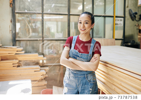Young female carpenter Young female carpenter 73787538