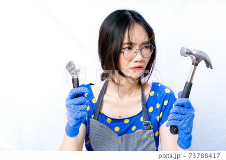 Asian girl with a mechanic job woman's problem 73788417