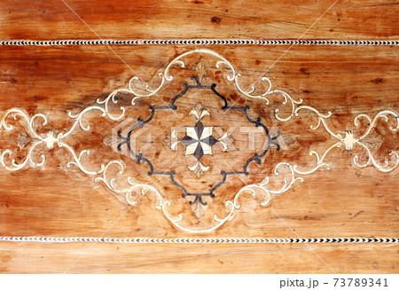 Detail of wooden wall panel with wood carving floral ornament, Shiraz, Iran Detail of wooden wall panel with wood carving floral ornament, Shiraz, Iran 73789341