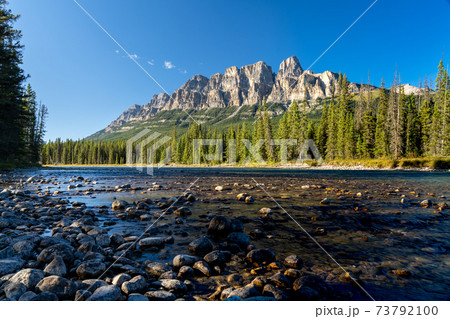 Castle Mountain and Bow River in summer sunny day. Castle Mountain viewpoint. Banff National Park, Canadian Rockies, Alberta, Canada. 73792100