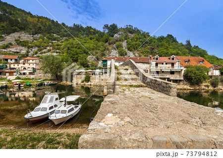 Old Bridge in Rijeka Crnojevica River near Skadar Lake - Montenegro 73794812