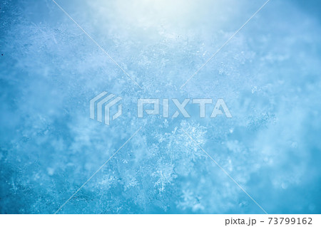 Macro background of fresh snowflake texture 73799162