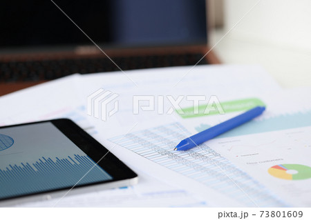 On table lies commercial graphics tablet and pen On table lies commercial graphics tablet and pen 73801609