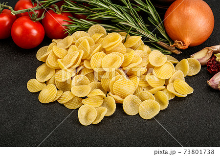 Raw Italian pasta - Orecchiette for cooking 73801738