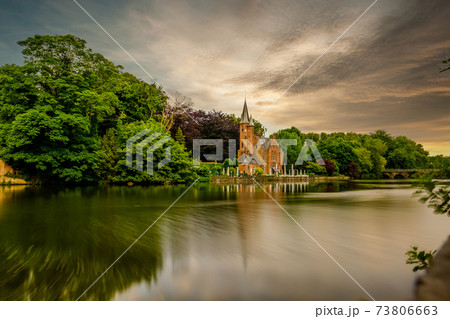 Bruges (Brugge) cityscape with Minnewater lake 73806663