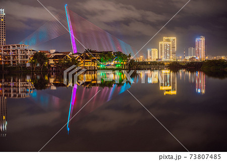 The architecture shimmering under the night-lit city makes the city more vibrant in Da Nang, Vietnam 73807485