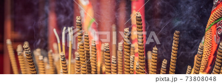 Incense burning Embossed in an incense pot. There is a lot of smoke BANNER, LONG FORMAT Incense burning Embossed in an incense pot. There is a lot of smoke BANNER, LONG FORMAT 73808048