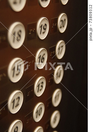 ホテルやビルのエレベーターのボタンの写真素材