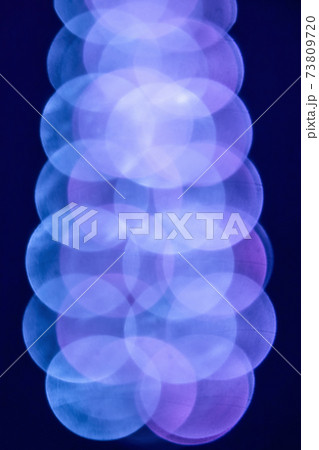Abstract pink and blue blurred lights resembling a large polymer molecule 73809720