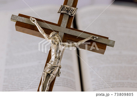 Open on the Holy bible with cross of the Christian cross the hope of mankind for salvation 73809805