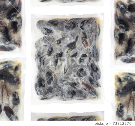 Frozen mussels in sash on a white background. Mussels in vacuum packaging on a white background. 73812276