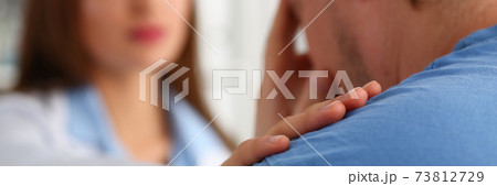 Male patient visiting his doctor the clinic 73812729