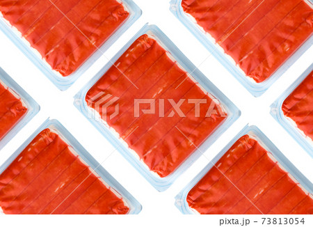 Crab sticks vacuum packed. Crab sticks from the store on a white background. 73813054