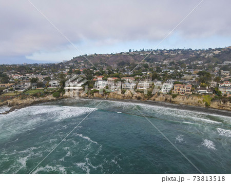 Aerial view of the the sea with cliff in La Jolla Hermosa town during gray day 73813518