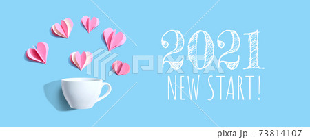 2021 New Start message with a coffee cup and paper hearts 73814107