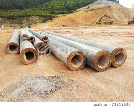 IPOH, MALAYSIA -MARCH 03, 2020:  Bore pile materials made from strong precast concrete designed by the engineers. It will be driven into the soil as the foundation and will be tied by pile caps. 73815636