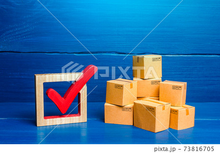 Boxes and red check mark. Verification and standardization of goods and imported products. Quality control. Available in stock. Import and Sale Permits. Trade agreements, turnover transfer convention Boxes and red check mark. Verification and standardization of goods and imported products. Quality control. Available in stock. Import and Sale Permits. Trade agreements, turnover transfer convention 73816705