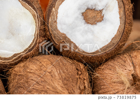 Coconuts heap close-up view Coconuts heap close-up view 73819875