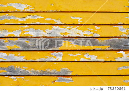 old wood pieces background texture surface and yellow color abrasions old wood pieces background texture surface and yellow color abrasions 73820861