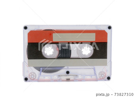 Compact audio tapes for magnetic recording on a white background.Compact cassettte Compact audio tapes for magnetic recording on a white background.Compact cassettte 73827310