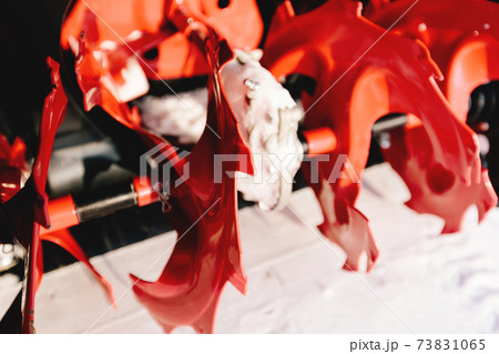 Red-black snowblower machine in the process of work Red-black snowblower machine in the process of work 73831065