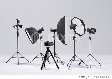 Photography studio flash on a lighting stand on white background 73833831