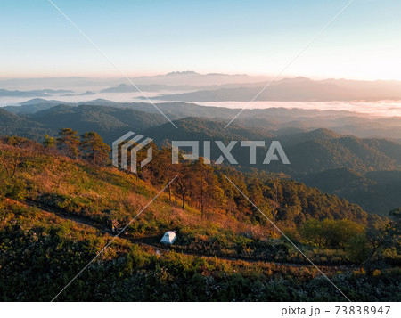 Camping on the mountain in the summer morning Camping on the mountain in the summer morning 73838947
