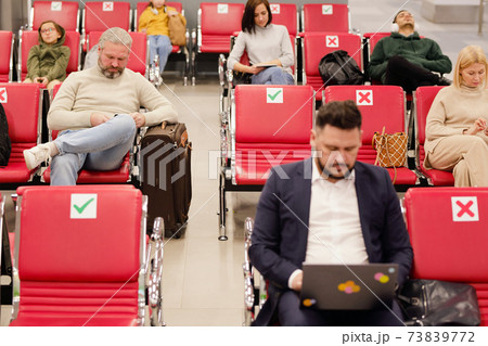 People waiting for departure 73839772