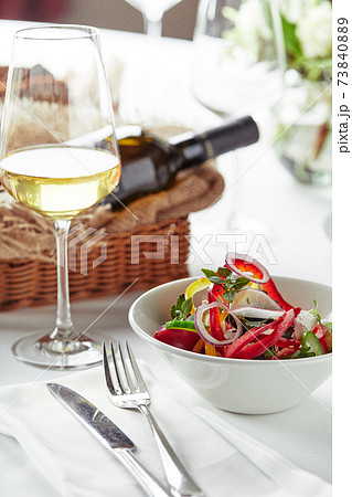 Classic Greek salad. Banquet festive dishes. Gourmet restaurant menu. White background. 73840889
