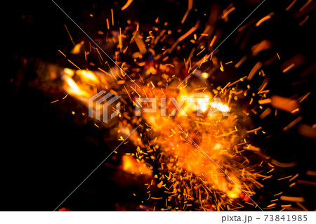 Beautiful bonfire with sparks flying upwards Beautiful bonfire with sparks flying upwards 73841985