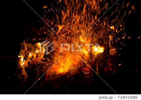 Beautiful bonfire with sparks flying upwards Beautiful bonfire with sparks flying upwards 73841986
