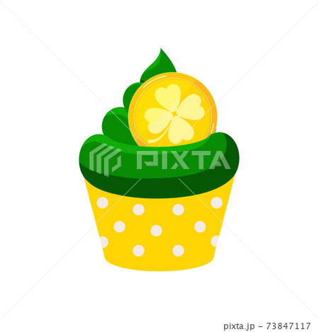 St Patrick cupcake with gold coin isolated on white background. 73847117