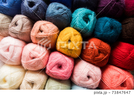 Various color balls of yarn as a background 73847647