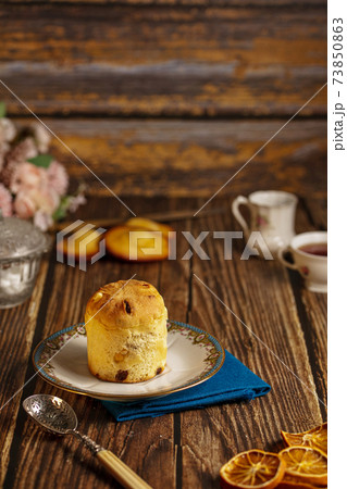 Small cake in a plate 73850863