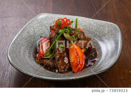 Beef with teriyaki sauce and vegetables 73859323