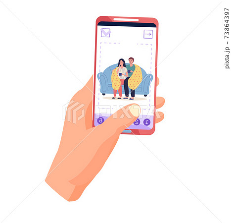 Guy holding phone with photo of couple on self-isolation. Man and woman in blanket drink tea Guy holding phone with photo of couple on self-isolation. Man and woman in blanket drink tea 73864397