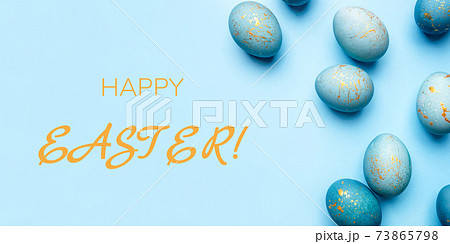 Easter frame of eggs painted in blue color. 73865798
