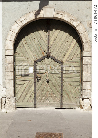 Typical decorated wooden door, Budapest. 73866472