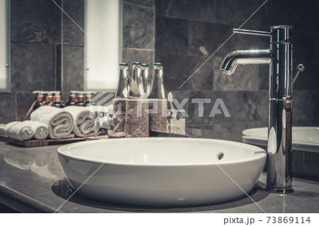 Contemporary mixer tap in the bathroom Contemporary mixer tap in the bathroom 73869114