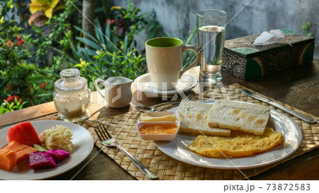 Traditional tourist breakfast in Bali 73872583