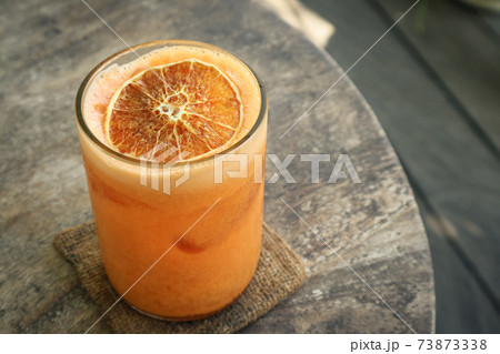 Orange Cocktail with orange, carrot and papaya juice 73873338