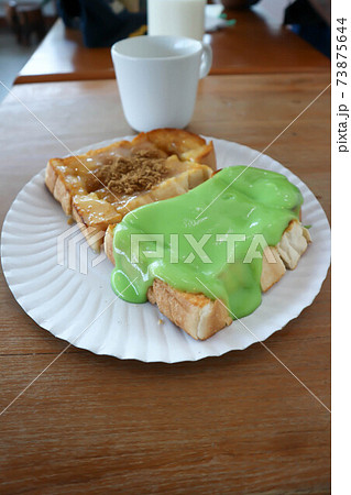 toast with custard topping and milk toast with custard topping and milk 73875644