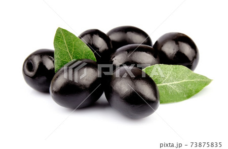 Olives with leaves on white backgrounds. Olives with leaves on white backgrounds. 73875835