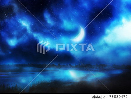 Crescent moon above river Crescent moon above river 73880472