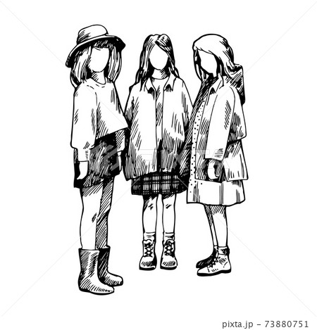 Three teenage girls in raincoats stand next to each other 73880751