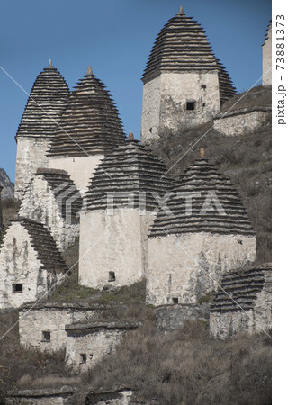 Dargavs is the city of the dead. Medieval necropolis in the Caucasus Mountains Dargavs is the city of the dead. Medieval necropolis in the Caucasus Mountains 73881373