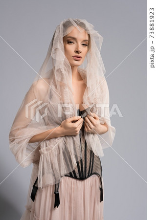 Fashionable young female model in vintage outfit Fashionable young female model in vintage outfit 73881923