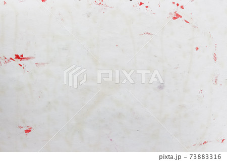 Old dirty paper background. Texture of used vintage white paper with spots and blots 73883316