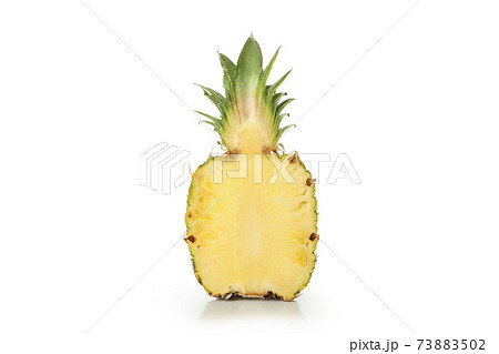 Half of ripe pineapple isolated on white background 73883502