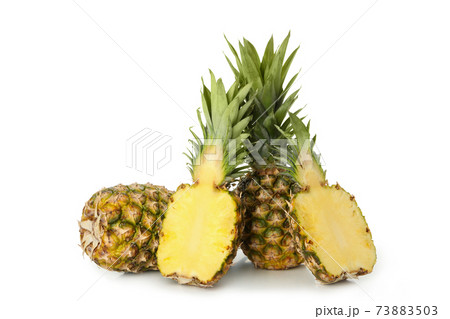 Tasty ripe pineapples isolated on white background 73883503